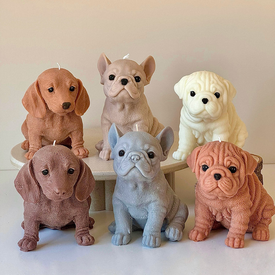 A group of puppy candles, Dachshund, French Bulldog and Bulldog